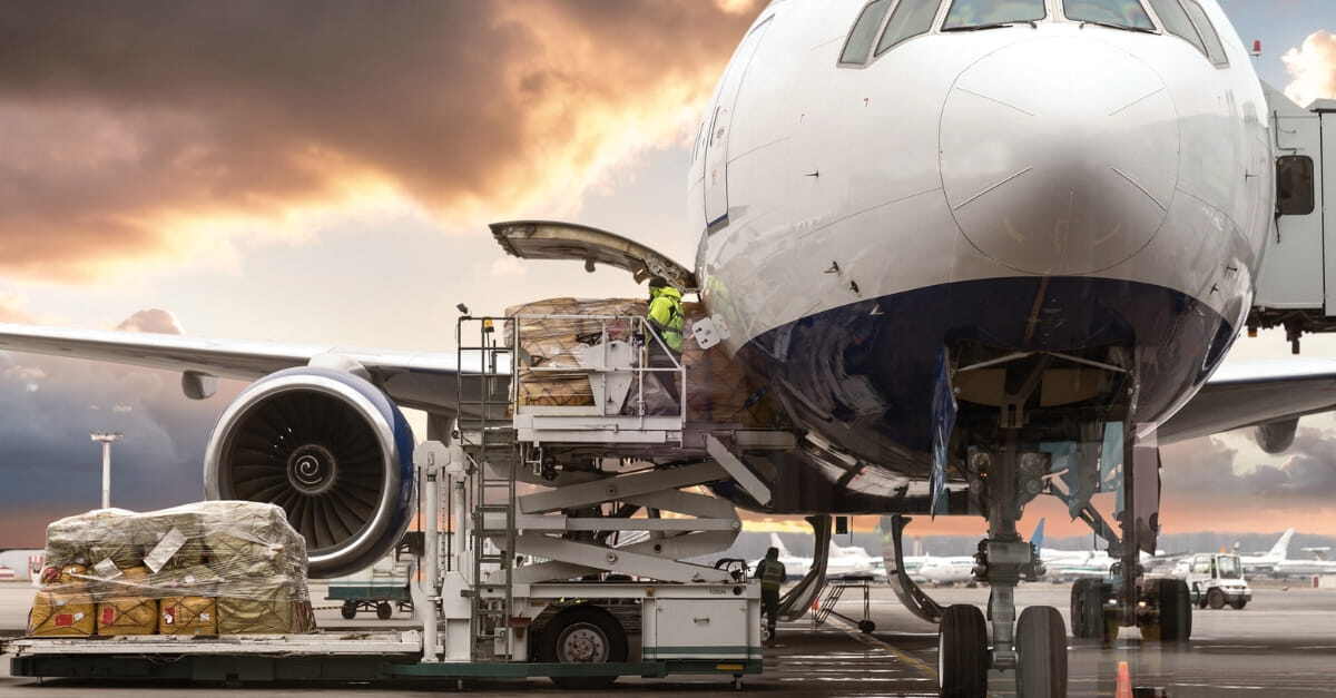 freight being loaded onto charter plane